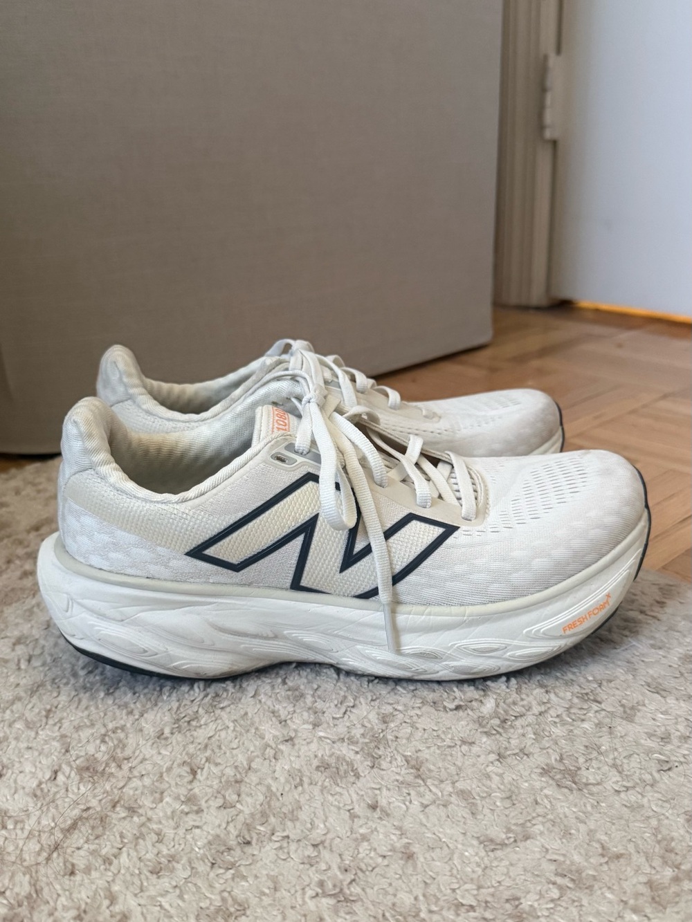 New Balance Women’s White Sneakers with Navy Trim